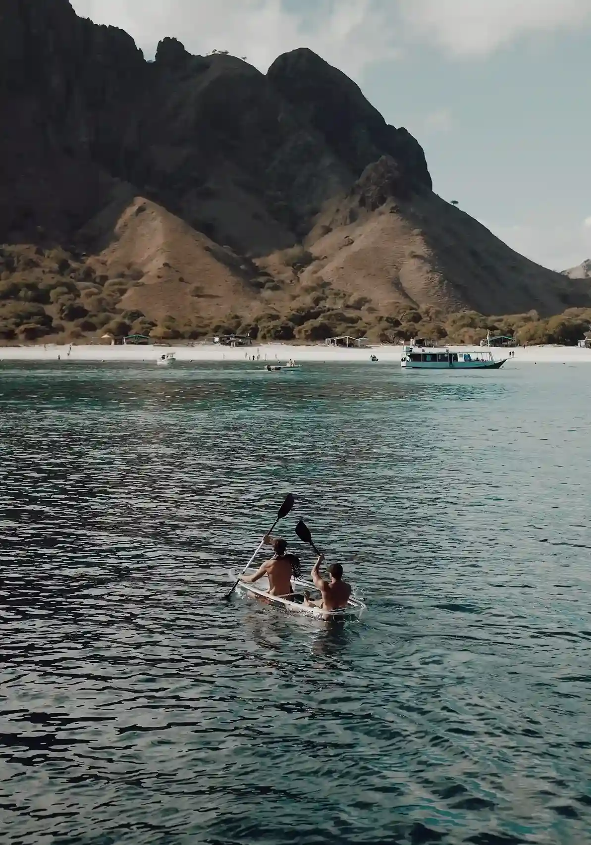 Paddleboarding from Lamborajo 3 in a calm bay