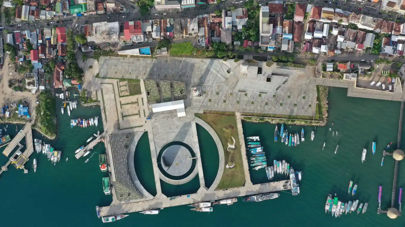 Labuan Bajo harbour from above, boats along the quay
